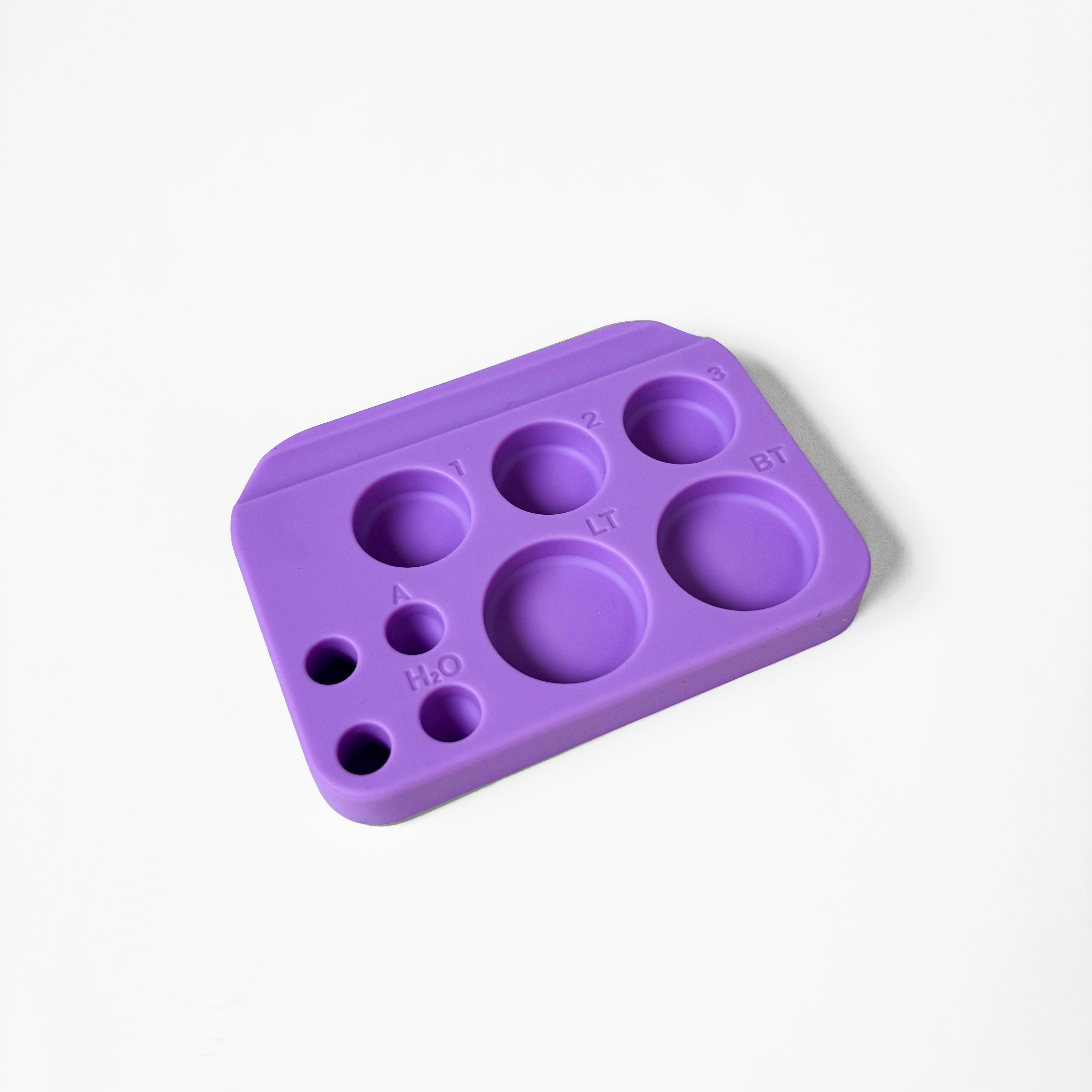 Purple silicone mold on a white background